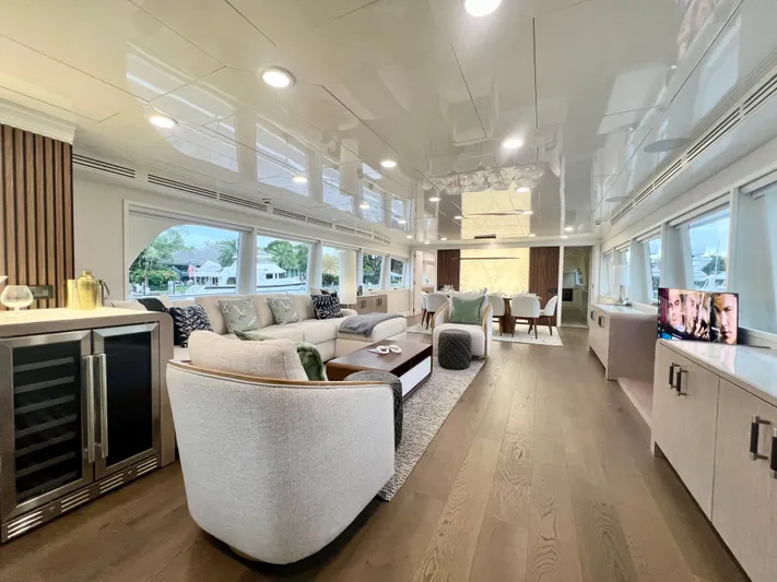 Panacea Yacht Photos Pics Luxurious interior of 2011 Mengi Yay 115 MY yacht with modern furnishings and large windows.