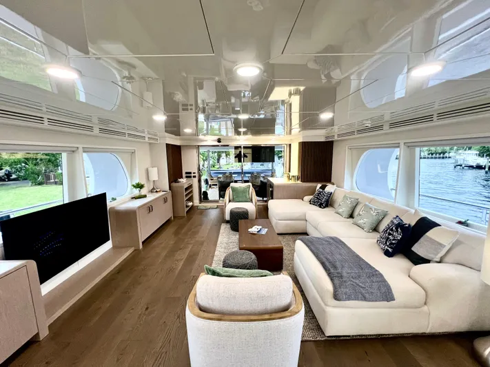 Panacea Yacht Photos Pics Luxurious interior of 2011 Mengi Yay 115 MY yacht with modern furnishings and large windows.