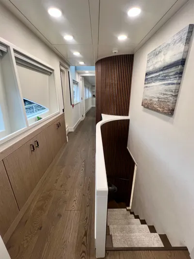 Panacea Yacht Photos Pics Luxurious interior hallway of 2011 Mengi Yay 115 MY yacht with modern decor.