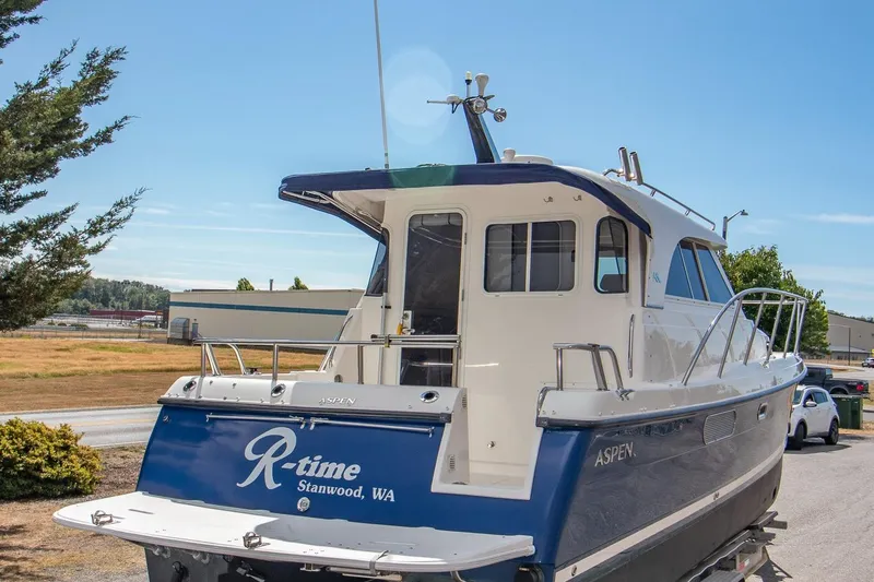 R Time Yacht Photos Pics 2013 Aspen C90 boat named "R-time" in Stanwood, WA, parked outdoors.