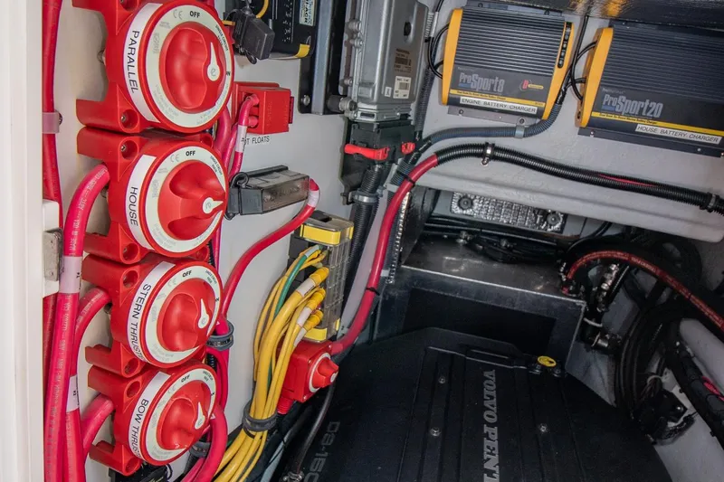 R Time Yacht Photos Pics Engine compartment of 2013 Aspen C90 with battery switches and chargers.