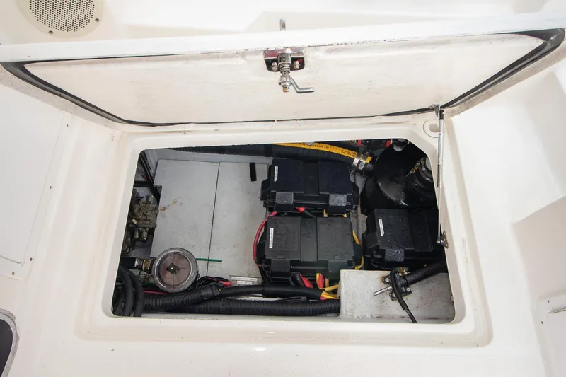 R Time Yacht Photos Pics 2013 Aspen C90 boat engine compartment with batteries and wiring visible.