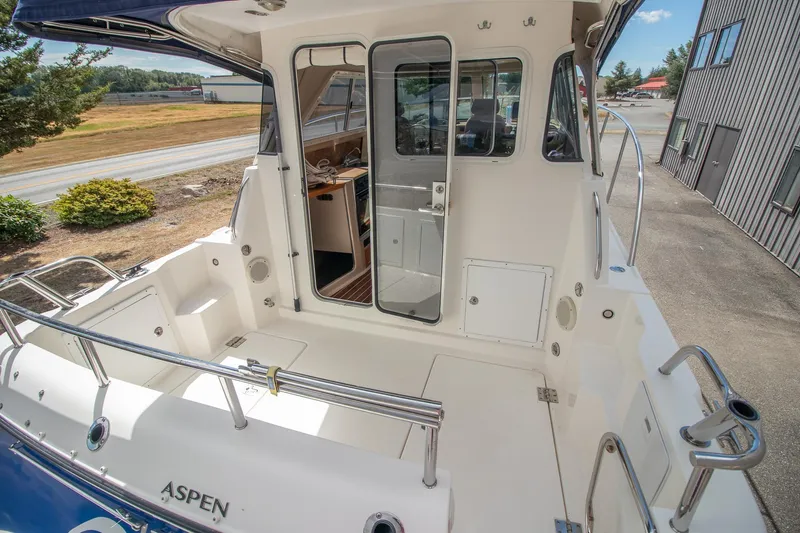 R Time Yacht Photos Pics 2013 Aspen C90 boat with open deck and cabin entrance.
