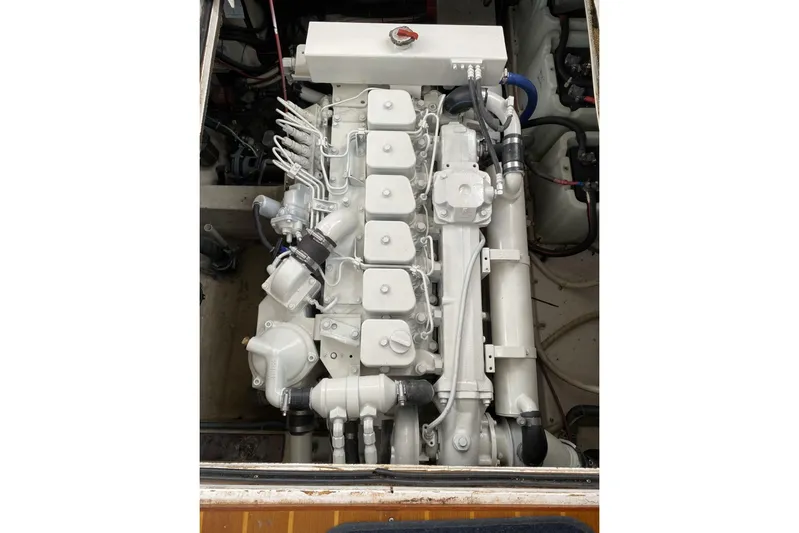 Escapade Yacht Photos Pics Engine of 1999 Legacy Yachts 40 Sedan, showcasing detailed mechanical components.