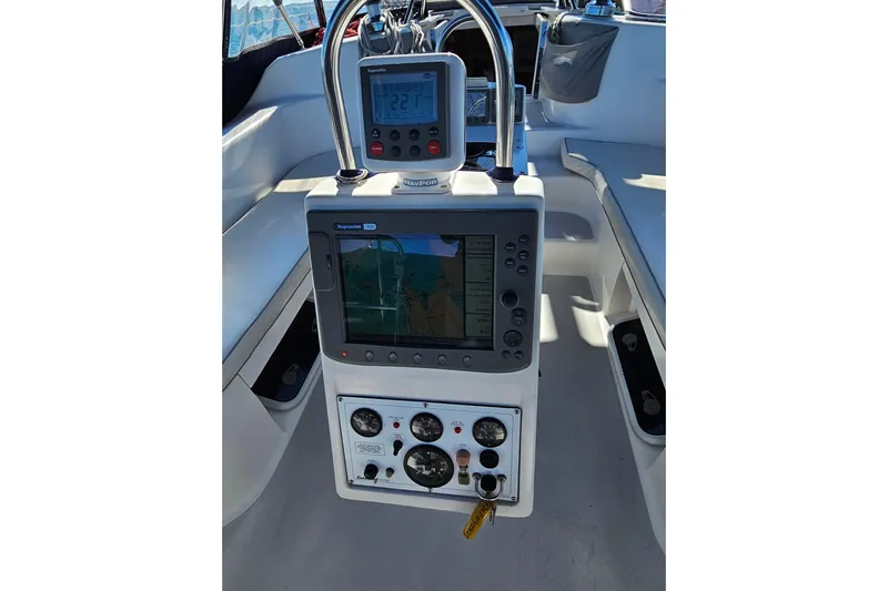 "juniper" Yacht Photos Pics Cockpit navigation system of 2006 Catalina 400 MkII sailboat, featuring Raymarine electronics.