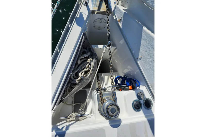 "juniper" Yacht Photos Pics Anchor locker of 2006 Catalina 400 MkII sailboat with ropes and chain.