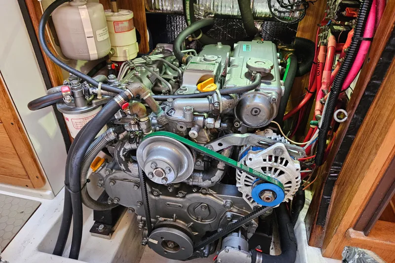 "juniper" Yacht Photos Pics Engine compartment of a 2006 Catalina 400 MkII sailboat, showing detailed mechanical components.