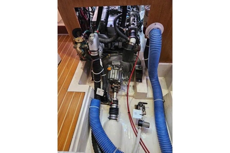 "juniper" Yacht Photos Pics Engine compartment of a 2006 Catalina 400 MkII sailboat, showing detailed mechanical components.