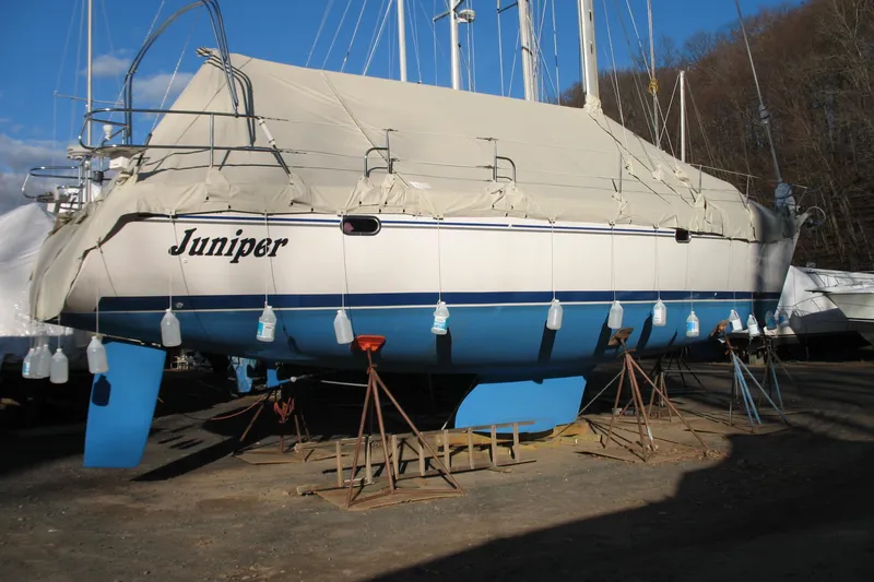"juniper" Yacht Photos Pics Catalina 400 MkII sailboat, 2006 model, covered and supported on stands in a boatyard.