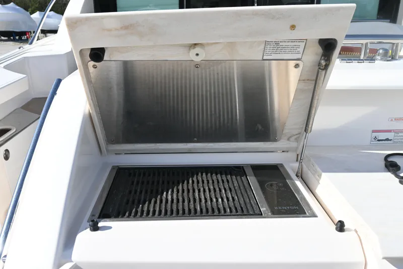 Present Tense Yacht Photos Pics Outdoor grill on 2017 Tiara 44 Coupe yacht