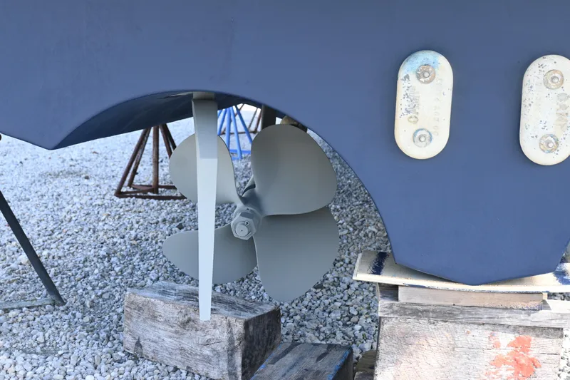 Present Tense Yacht Photos Pics Propeller of 2017 Tiara 44 Coupe on dry dock,