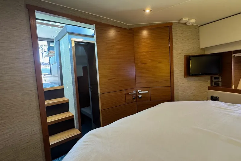 Present Tense Yacht Photos Pics Master cabin with half cabin door