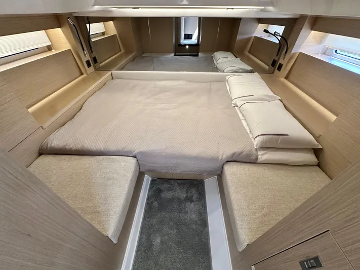 Yacht Photos Pics 2025 Jeanneau DB/37 OB cabin with cozy bed and modern design.