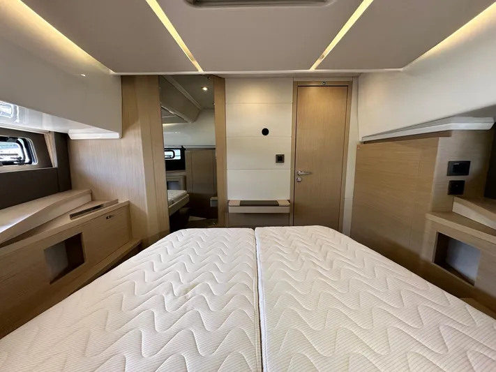  Yacht Photos Pics Luxurious interior cabin of 2025 Jeanneau DB/37 OB yacht with modern design.