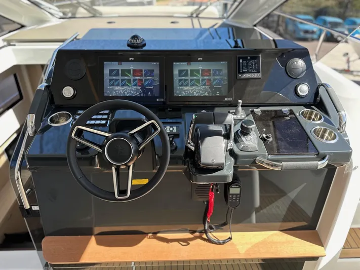  Yacht Photos Pics 2025 Jeanneau DB/37 OB helm with advanced navigation displays and controls.