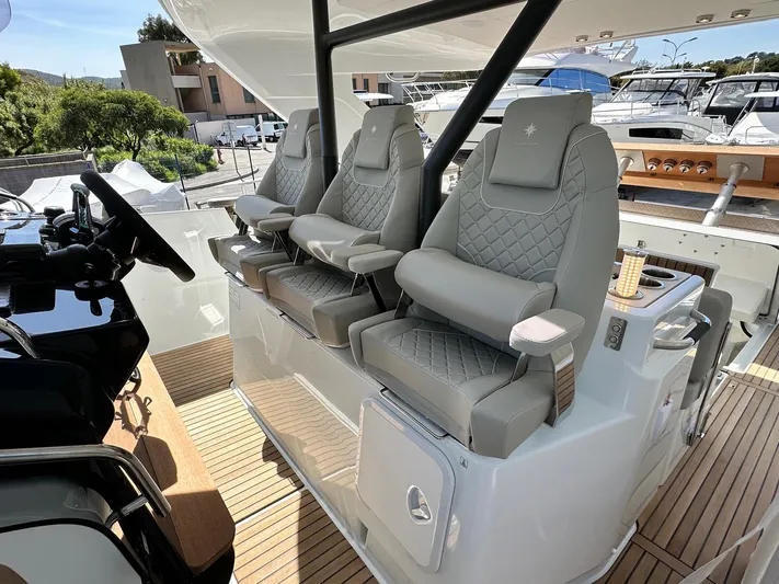  Yacht Photos Pics Luxurious seating on 2025 Jeanneau DB/37 OB boat, featuring elegant design and modern amenities.
