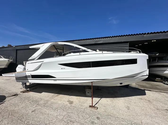  Yacht Photos Pics 2025 Jeanneau DB/37 OB boat displayed outdoors on a sunny day.