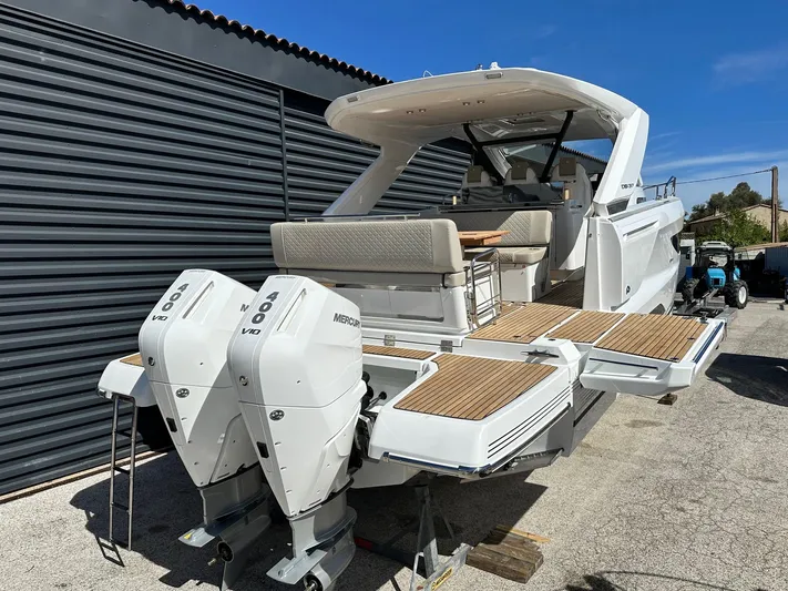  Yacht Photos Pics 2025 Jeanneau DB/37 OB boat with dual Mercury 400 V10 engines, docked outdoors.