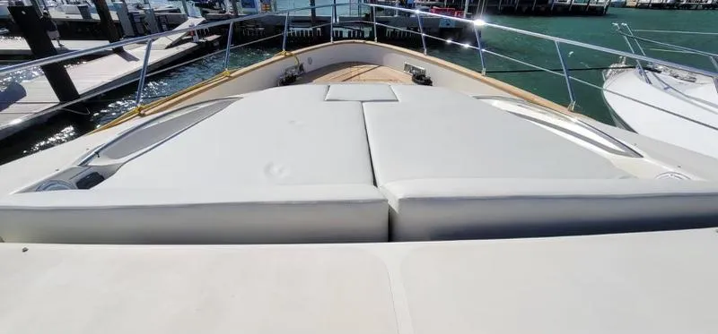 Thinks It's His Too Yacht Photos Pics 2008 Azimut Flybridge yacht with spacious sunbathing area at the bow.