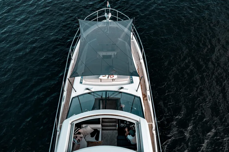  Yacht Photos Pics Aerial view of 2019 Prestige 590 S yacht on the water.