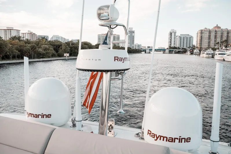  Yacht Photos Pics Prestige 590 S 2019 yacht with Raymarine equipment on a scenic waterfront.