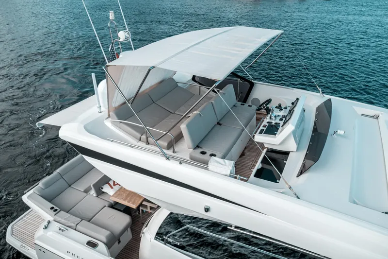 Yacht Photos Pics 2019 Prestige 590 S yacht with spacious deck and seating area.