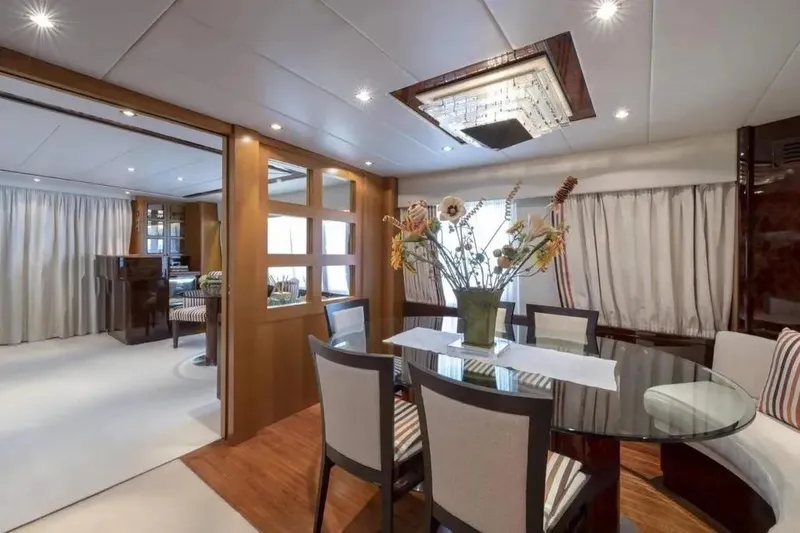  Yacht Photos Pics Luxurious interior of 2017 Codecasa Falco 24 yacht with elegant dining area and modern decor.