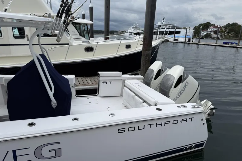  Yacht Photos Pics 2018 Southport 33 FE boat docked with Suzuki outboard motors.