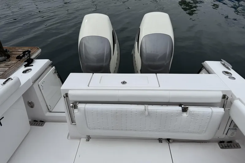  Yacht Photos Pics 2018 Southport 33 FE boat with dual outboard engines at dock.