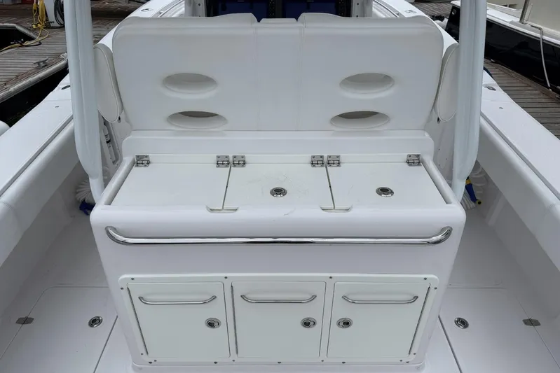  Yacht Photos Pics 2018 Southport 33 FE boat interior with storage compartments and seating.