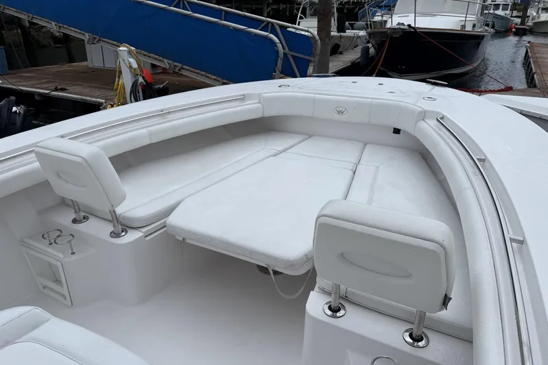  Yacht Photos Pics 2018 Southport 33 FE boat with spacious white seating area at the bow.
