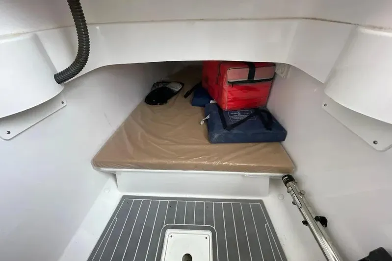  Yacht Photos Pics 2018 Southport 33 FE cabin interior with storage and equipment.