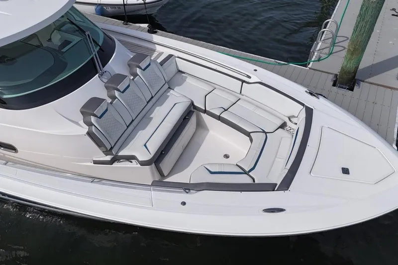 Carry On Yacht Photos Pics 2021 Tiara Sport 43 LS boat with spacious seating at the dock.
