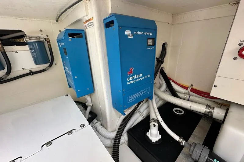 Carry On Yacht Photos Pics Battery chargers in 2021 Tiara Sport 43 LS boat engine room.