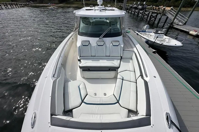 Carry On Yacht Photos Pics 2021 Tiara Sport 43 LS luxury boat docked, featuring spacious seating and sleek design.