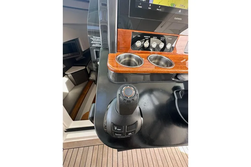 Carry On Yacht Photos Pics 2021 Tiara Sport 43 LS helm with joystick control and navigation display.