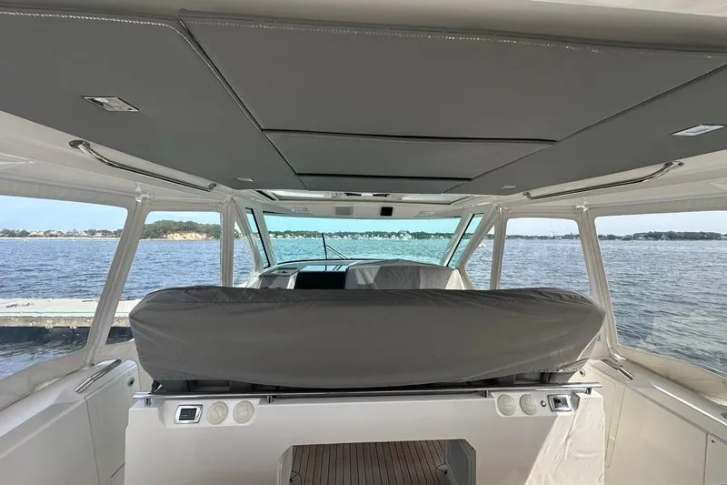 Carry On Yacht Photos Pics Interior view of 2021 Tiara Sport 43 LS yacht with ocean backdrop.