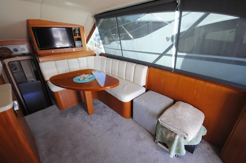  Yacht Photos Pics Luxurious interior of 1999 Ocean Yachts 45 Super Sport with seating and TV.