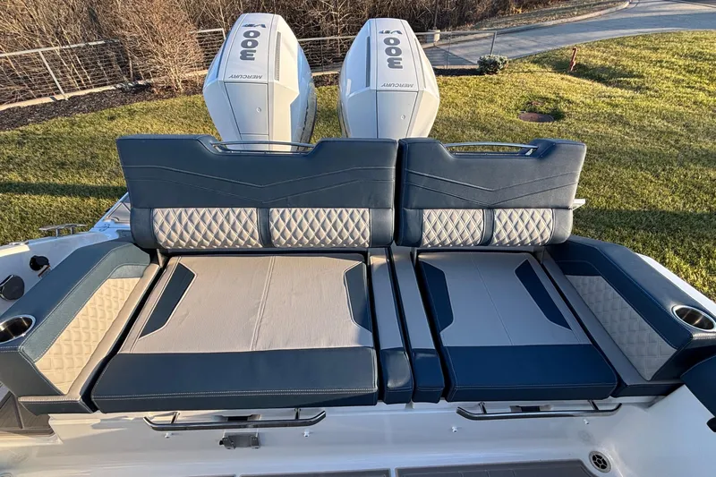  Yacht Photos Pics Luxury seating on 2026 Monterey Elite 30 OB boat with dual Mercury engines.