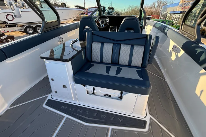  Yacht Photos Pics 2026 Monterey Elite 30 OB boat interior with luxurious seating and modern design.