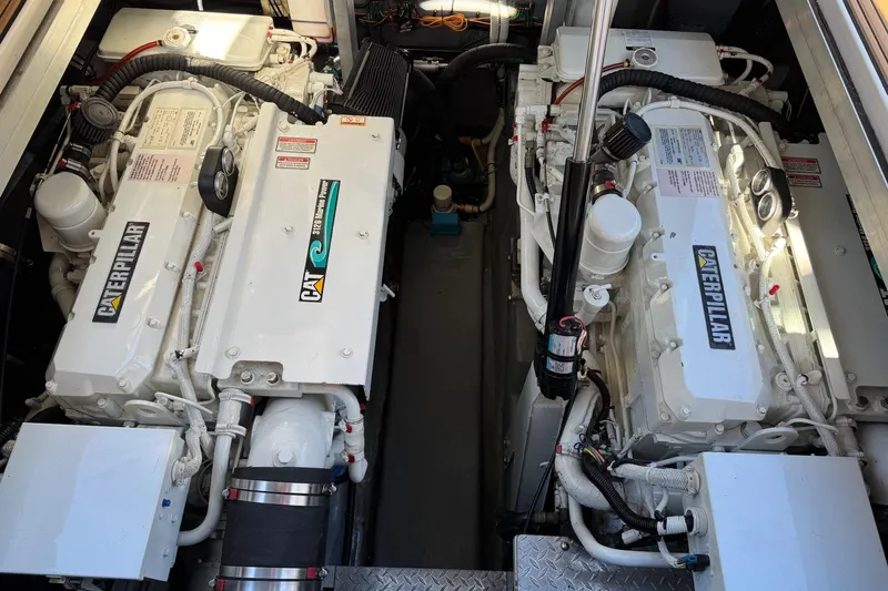  Yacht Photos Pics Engine room of a 2000 Sea Ray 380 Sundancer with twin Caterpillar engines.