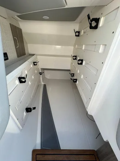  Yacht Photos Pics 2023 Regal LX36 interior cabin with sleek white design and modern fixtures.