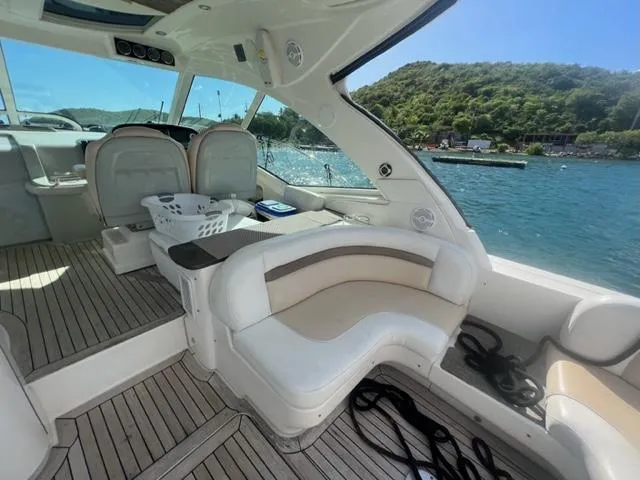  Yacht Photos Pics Luxurious 2012 Sea Ray 500 Sundancer yacht interior with scenic waterfront view.