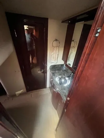  Yacht Photos Pics Interior of 2012 Sea Ray 500 Sundancer bathroom with sink and mirror.