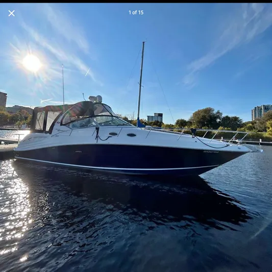  Yacht Photos Pics 2005 Sea Ray 340 Sundancer yacht docked on a sunny day.