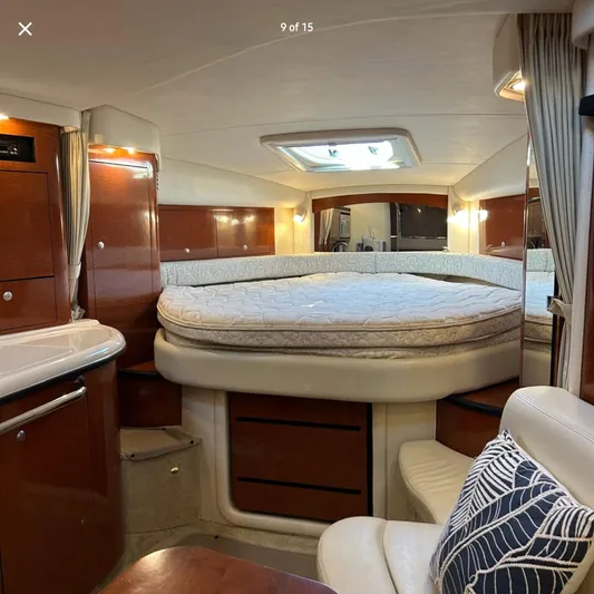  Yacht Photos Pics Luxurious interior of 2005 Sea Ray 340 Sundancer yacht with elegant wood finishes.