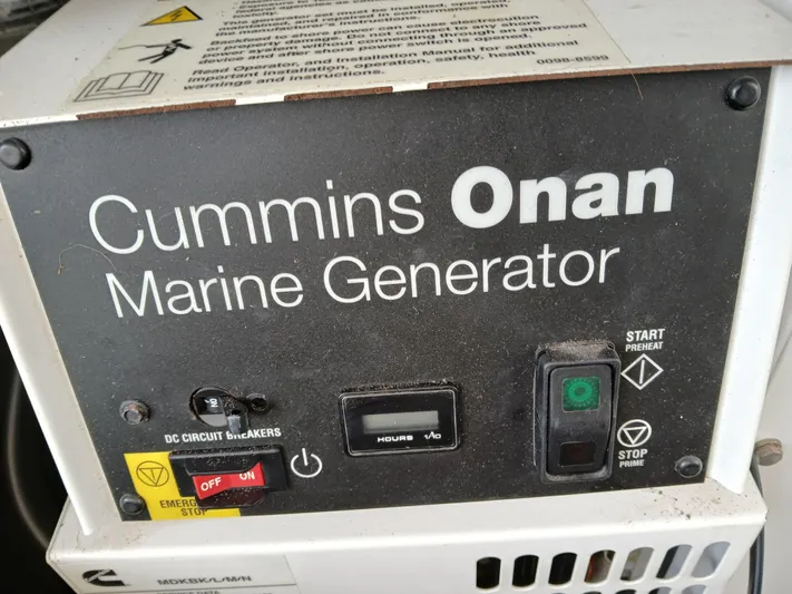 Patange II Yacht Photos Pics Cummins Onan marine generator control panel on a 2009 Lagoon 440 yacht.