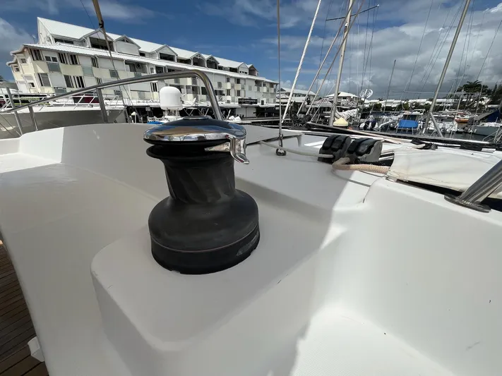 Patange II Yacht Photos Pics 2009 Lagoon 440 yacht deck with winch, docked in marina.
