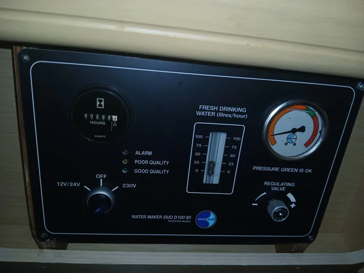 Patange II Yacht Photos Pics Control panel of a 2009 Lagoon 440 water maker system, showing pressure and quality indicators.