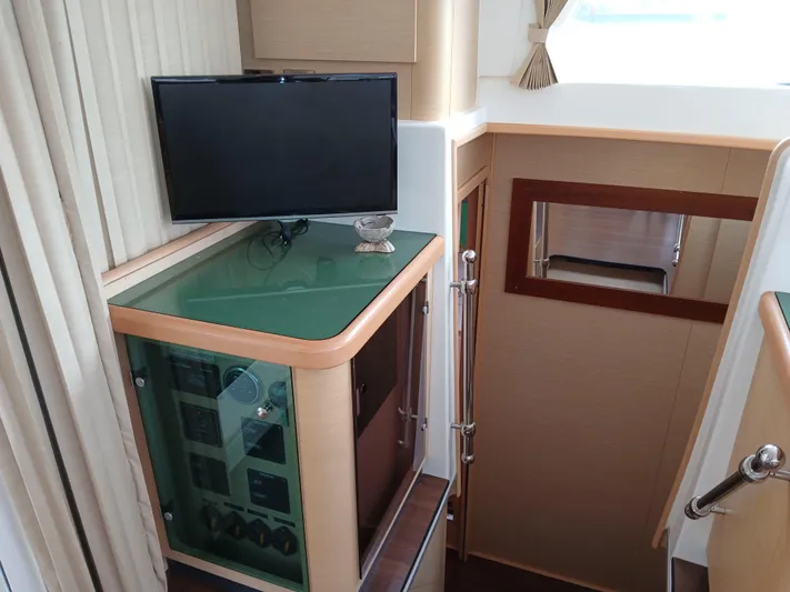 Patange II Yacht Photos Pics Interior of 2009 Lagoon 440 yacht with TV and control panel.